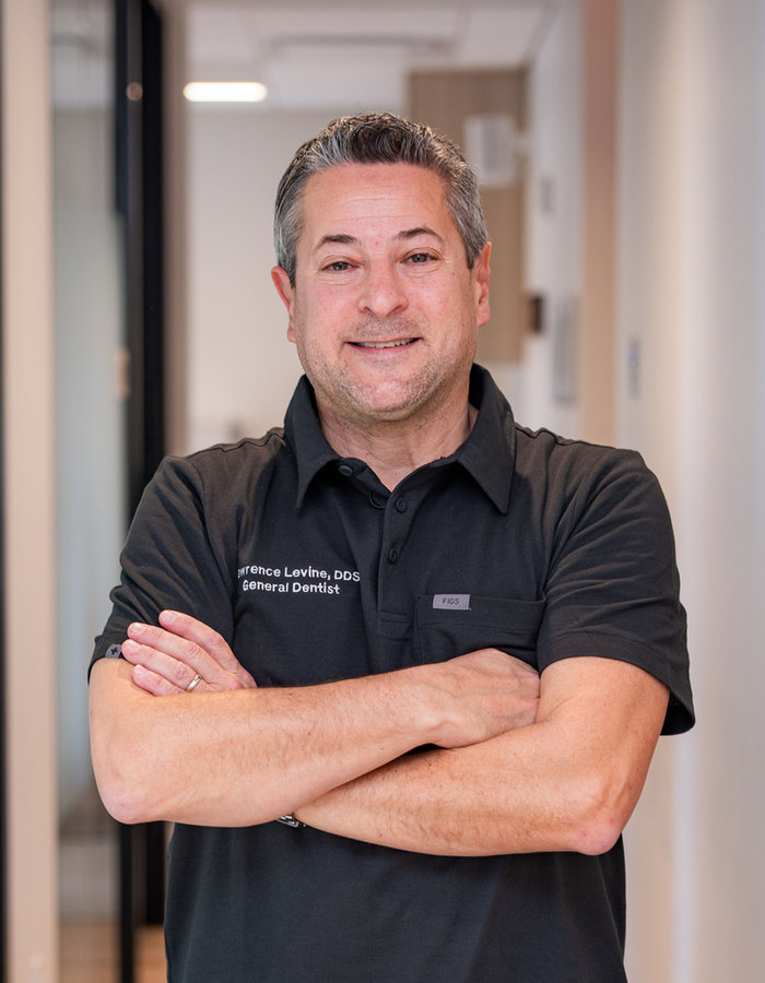 Portrait of Dr. Lawrence S. Levine, DDS at Madison Dental Group.